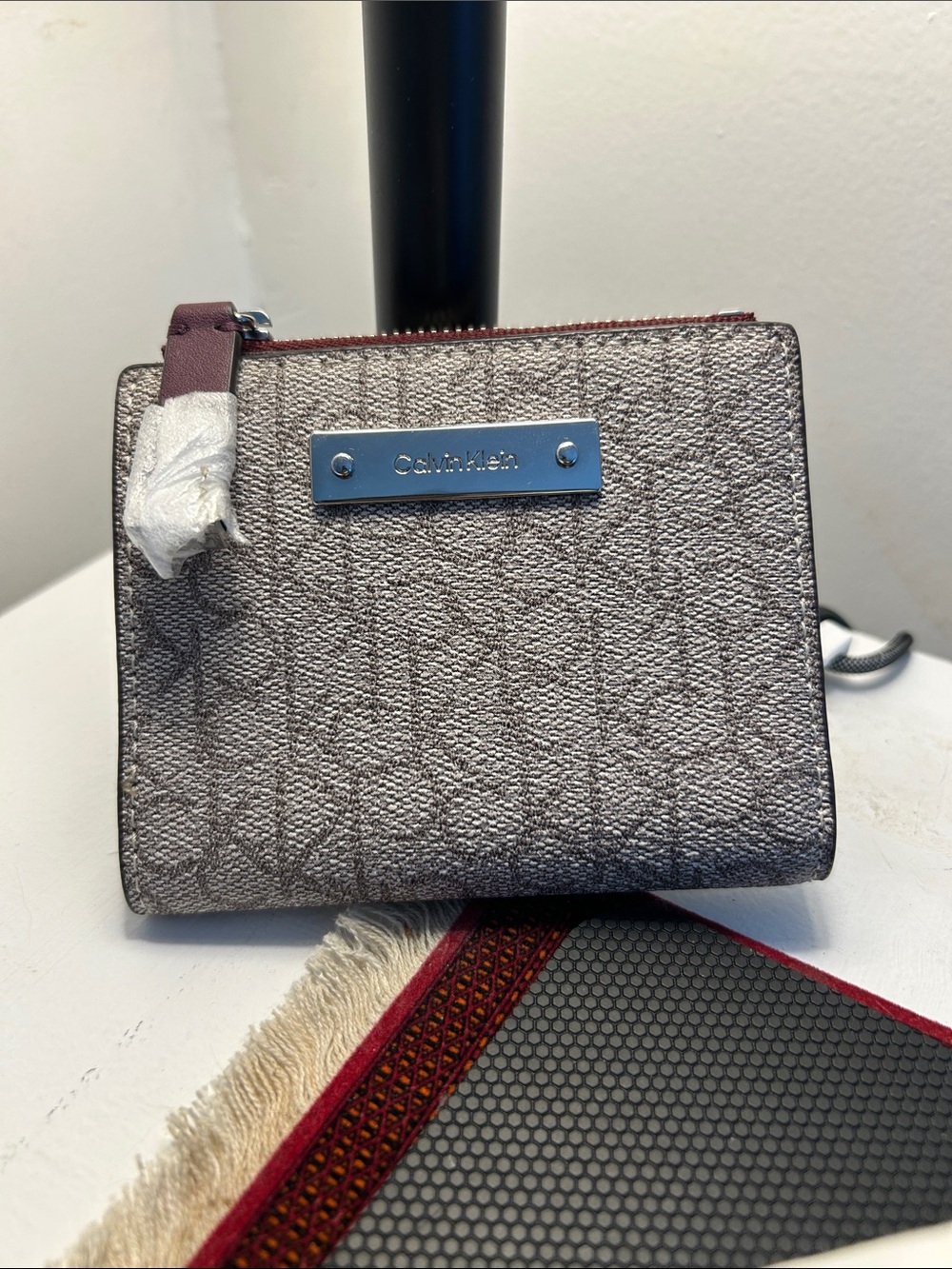 Calvin Klein Gray Monogram Zip Wallet with Burgundy Pull